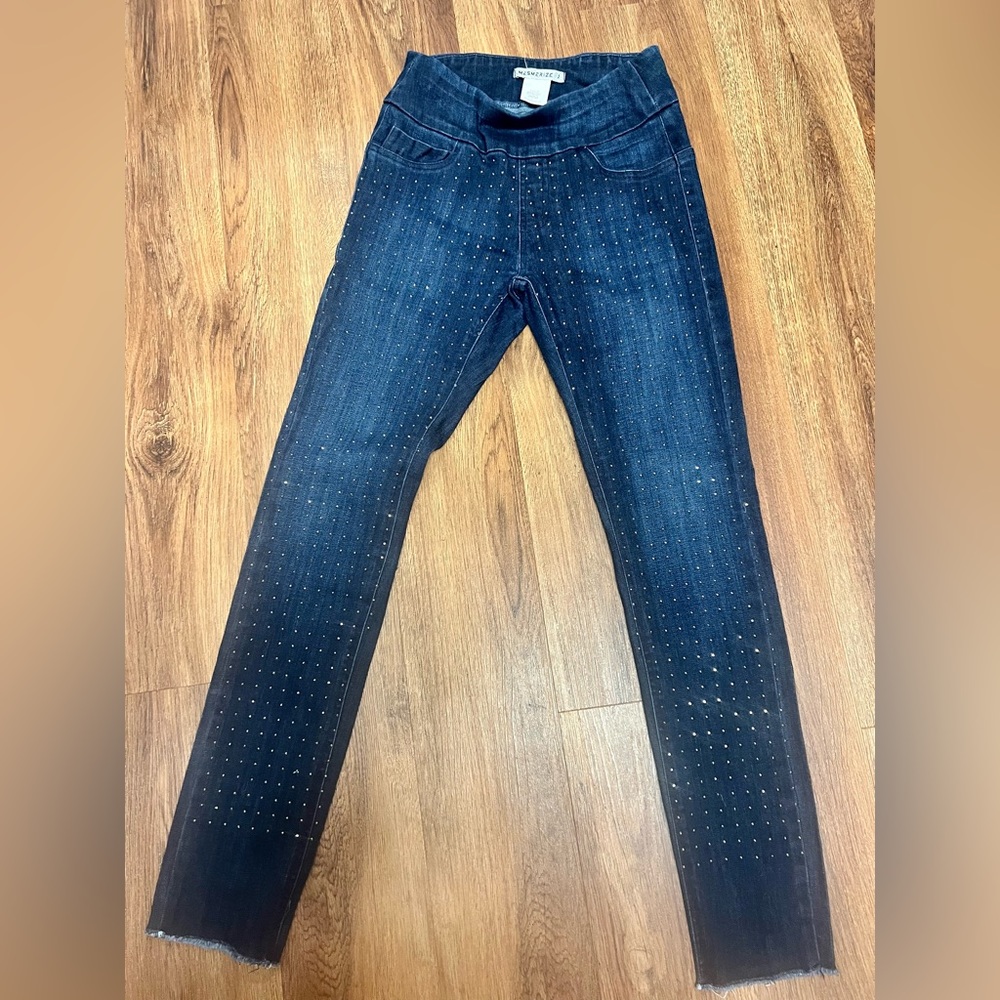 Blue Jeans with rhinestones on the front.